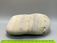 gray rock with alternating gray and yellow layers